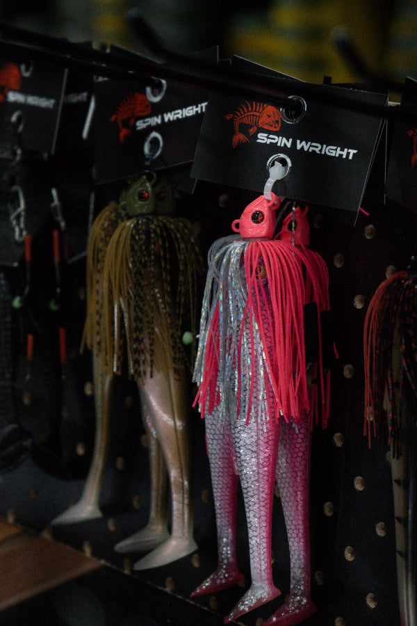 Spin Wright fishing lures hanging on a rack